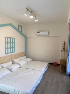 Voodi või voodid majutusasutuse Chiang Mi No.1 B&B toas