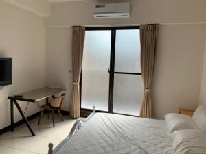 Voodi või voodid majutusasutuse Chiang Mi No.1 B&B toas