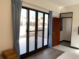 Voodi või voodid majutusasutuse Chiang Mi No.1 B&B toas