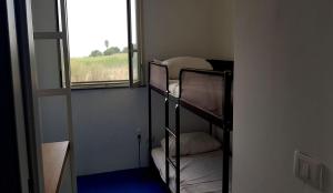 Posteľ alebo postele v izbe v ubytovaní villa Lùmar fronte mare