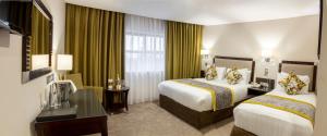 Katil atau katil-katil dalam bilik di McGettigans Hotel