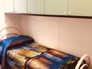Katil atau katil-katil dalam bilik di Casa vacanze vista mare a Budoni - sam01