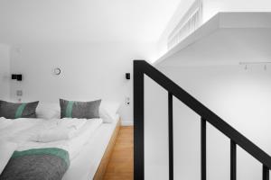Posteľ alebo postele v izbe v ubytovaní Jobelhome Apartments