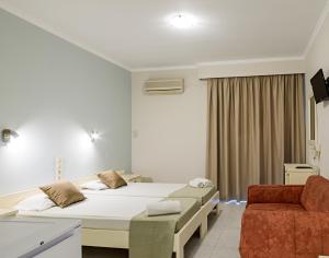 Ένα ή περισσότερα κρεβάτια σε δωμάτιο στο Karras Livin