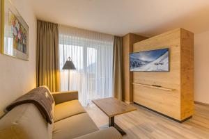 TV a/nebo společenská místnost v ubytování Residenz Schiestl
