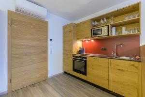 Kuchyň nebo kuchyňský kout v ubytování Residenz Schiestl