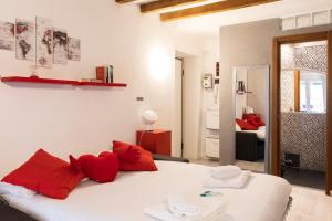 Ένα ή περισσότερα κρεβάτια σε δωμάτιο στο Casa Vittoria - ISOLA District