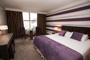 Voodi või voodid majutusasutuse Brandon House Hotel toas