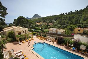 a view of a pool at a resort at PINOS ALTOS 04 in Cala de Sant Vicenc