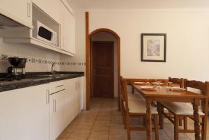 A kitchen or kitchenette at PINOS ALTOS 10