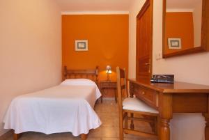 A bed or beds in a room at PINOS ALTOS 10