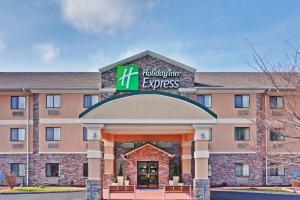 a rendering of the front of a holiday inn express hotel at Holiday Inn Express Winfield - Teays Valley by IHG in Hurricane