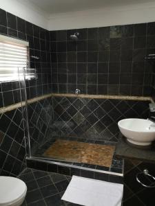 Kylpyhuone majoituspaikassa Lifestyle Corner Guesthouse