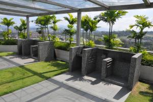 Κήπος έξω από το Kompleks EVO Syamimi Homestay