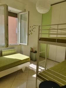 Postel nebo postele na pokoji v ubytování Appartamento Ca’ del Gian