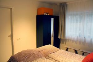 Ένα ή περισσότερα κρεβάτια σε δωμάτιο στο Polderhoek