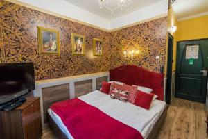 TV a/nebo společenská místnost v ubytování Janus Boutique Hotel & Spa