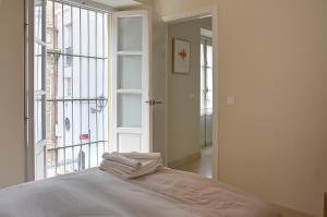 A bed or beds in a room at Apartamento Centro San Luis