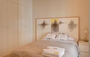 A bed or beds in a room at Apartamento Centro San Luis