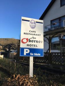 Ein Zertifikat, Auszeichnung, Logo oder anderes Dokument, das in der Unterkunft Am Obersee Hotel ausgestellt ist