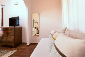 Postel nebo postele na pokoji v ubytování Hotel Rio Molas