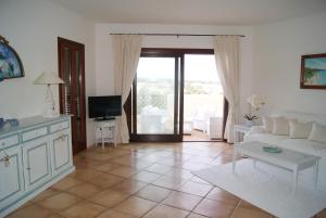 A television and/or entertainment centre at Case Della Marina