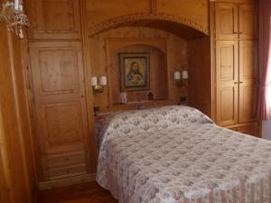 Postel nebo postele na pokoji v ubytování Cadore Haus
