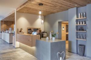Kuchyň nebo kuchyňský kout v ubytování Hotel Torgglerhof