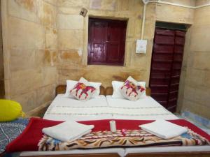Łóżko lub łóżka w pokoju w obiekcie Hotel Desert