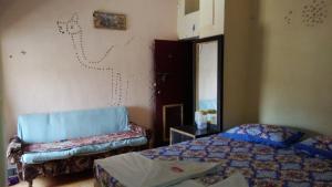 Łóżko lub łóżka w pokoju w obiekcie Hotel Desert