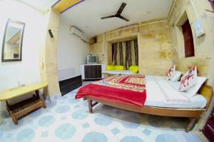 Łóżko lub łóżka w pokoju w obiekcie Hotel Desert