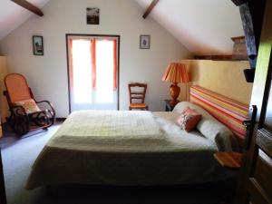 Кровать или кровати в номере Gîte des Cantines