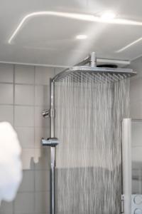Koupelna v ubytování Hotell Furusund + 24 fotografií