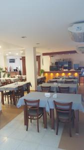 Un restaurant u otro lugar para comer en Hotel Plaza Andalgala