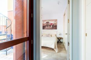 Posteľ alebo postele v izbe v ubytovaní Veoapartment Estrella