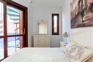 Posteľ alebo postele v izbe v ubytovaní Veoapartment Estrella