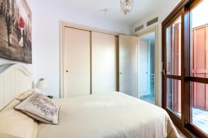 Posteľ alebo postele v izbe v ubytovaní Veoapartment Estrella