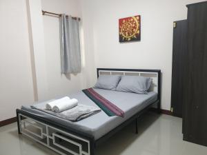 Кровать или кровати в номере TP home