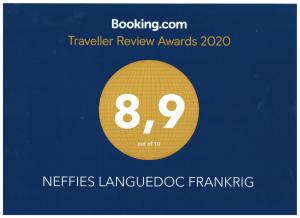 une affiche pour une revue de voyage récompensée par un cercle d'or dans l'établissement Neffies Languedoc Frankrig, à Néffiès
