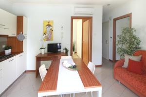 TV a/nebo společenská místnost v ubytování Residence Altamarea