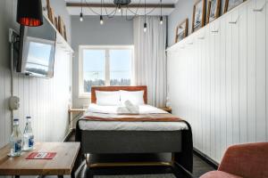 Postel nebo postele na pokoji v ubytování Hotell Furusund