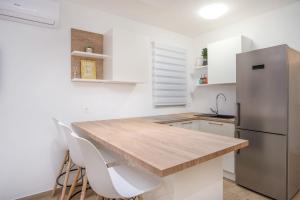Kuchyň nebo kuchyňský kout v ubytování Seaside apartments Polić, Rogoznica