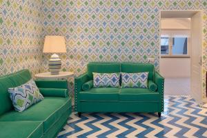 A seating area at SorrentoVibes - Design Holiday Home in Sorrento city center