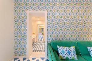 A seating area at SorrentoVibes - Design Holiday Home in Sorrento city center