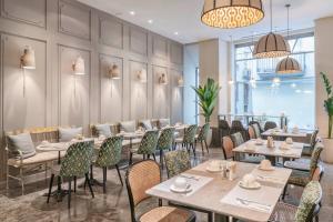 Reštaurácia alebo iné gastronomické zariadenie v ubytovaní Vincci Palace