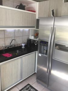A cozinha ou cozinha compacta de Casa Confortável