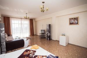 TV a/nebo společenská místnost v ubytování Hotel NATALI