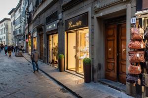 Hostia v ubytovaní Borgo San Lorenzo Attico Duomo