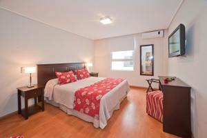 Ένα ή περισσότερα κρεβάτια σε δωμάτιο στο Hotel Esmeralda Select