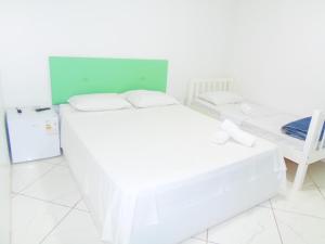 Cama o camas de una habitación en RAFAELLO HOTEL